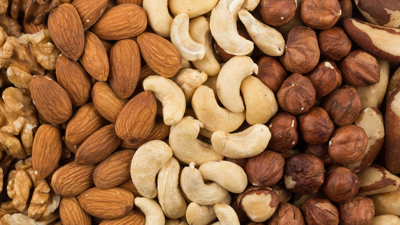 U.S. adults put on about a pound a year on average. But people who had a regular nut-snacking habit put on less weight and had a lower risk of becoming obese over time, a new study finds.